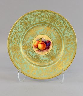Modern Worcester cabinet plate with turquoise border highlighted in gilt, the centre painted with apples and berries, diamete