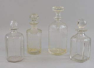 Two square decanters and two bottle decanters. the tallest 26cm
