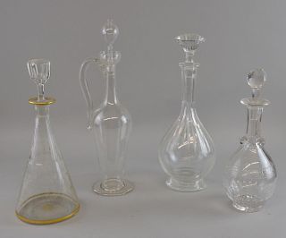 Malett shaped decanter, tear drop shaped decanter and two others, the tallest 33cm