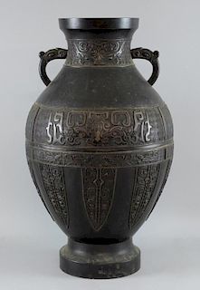 Chinese bronze twin handled vase with horizontal decorated  bands, styalised decoration, 56cm high,