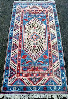 Persian type  cream ground rug  with a central medallion 99cm x 103cm