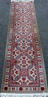 Persian type blue ground runner with repeating medallions, 296cm x 85cm