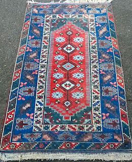 Persian type blue ground rug with stepped medallion 224cm x 120cm