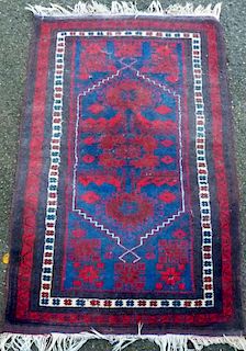 Persian type red ground rug with stepped medallion 130cm x 76cm