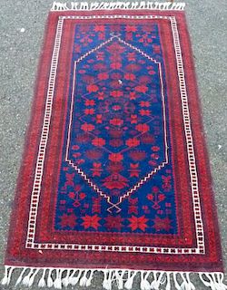 Persian blue ground  rug with stepped medallion 190cm x 110cm
