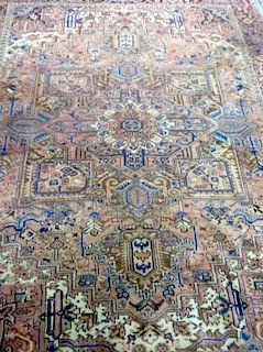 Persian type cream ground carpet with a main red border the centre with repeating foliate forms,  320cm x 240cm
