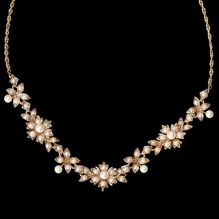 ANTIQUE GOLD NECKLACE, AS A GARLAND OF FLOWER HEADS, EACH SET WITH PEARLS