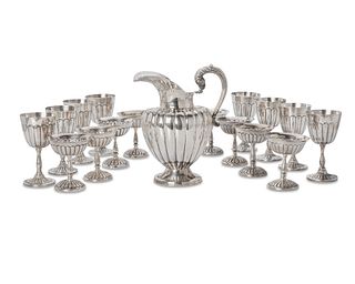 A Mexican silver beverage set