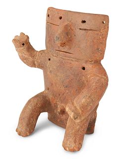A Quimbaya ceramic seated figure