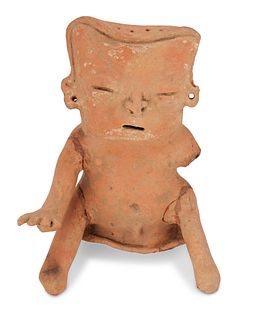 A Rio Magdalena ceramic seated figure