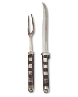 A William Spratling sterling silver and ebony carving set