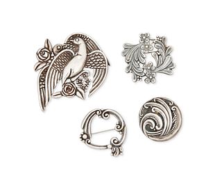 A group of Margot de Taxco sterling silver brooches