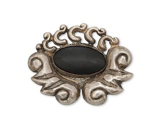 A Matl silver and onyx brooch
