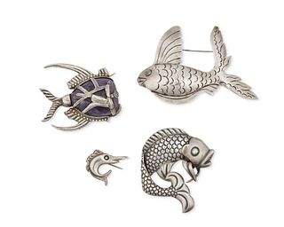 A group of Mexican silver fish brooches