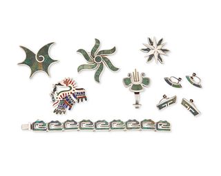 A group of Mexican silver and inlay jewelry