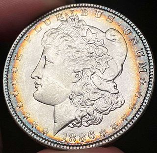 1886 Morgan Silver Dollar MS66 Rainbow Rim