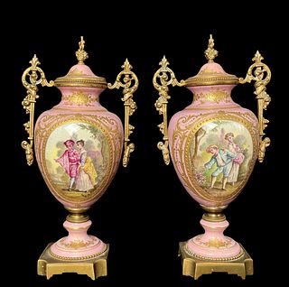 A Pair Of 19th C. French Sevres Hand Painted Porcelain Bronze Covered Vases