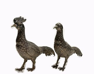 A Pair Of Pheasant Silver Figurines