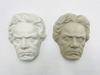 Pair of Figurative Wall Sculptures.