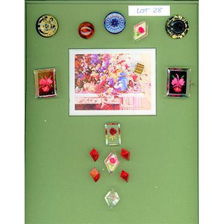 A CARD OF DIVISION THREE VINTAGE LUCITE BUTTONS