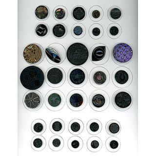 A CARD OF ASSORTED DIV 1 AND 3 BLACK GLASS BUTTONS