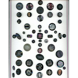 A FULL CARD OF DIV. 1 ASSORTED IMITATION FABRIC BUTTONS