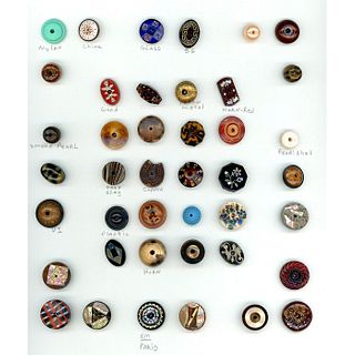 A CARD OF DIVISION 1 ASSORTED MATERIAL WHISTLE BUTTONS