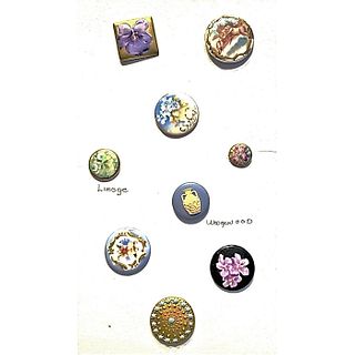 A SMALL CARD OF ASSORTED PORCELAIN STUD BUTTONS