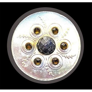 A DIVISION ONE ENGRAVED AND JEWELED PEARL BUTTON