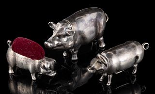 ENGLISH AND OTHER FIGURAL PIG STERLING SILVER MATCH SAFES AND PINCUSHION, LOT OF THREE