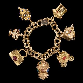 VINTAGE 14K YELLOW GOLD CHARM BRACELET WITH 14K AND 18K GOLD CHARMS
