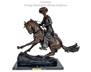 Large Cowboy Sculpture By Remington
