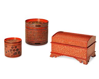 A group of Burmese red lacquered boxes