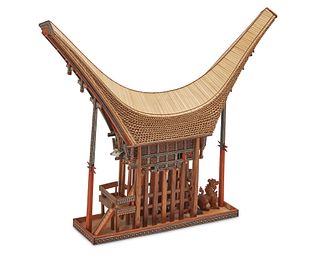 A polychromed wood and bamboo model of a Torajan spirit house