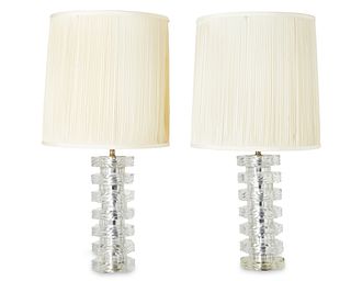 A pair of Lucite and chrome table lamps