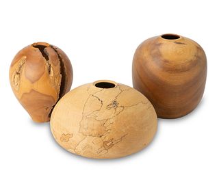 A group of turned wood vessels