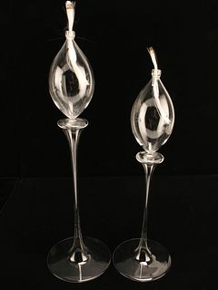 TWO GLASS OIL PILLAR CANDLES WITH WICKS