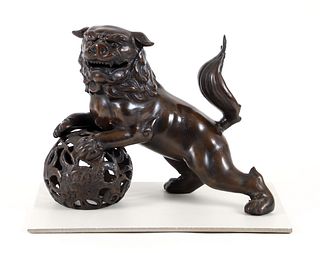 Bronze Fu Dog Leaning on Globe