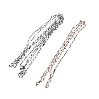 Three gem-set, silver long chains