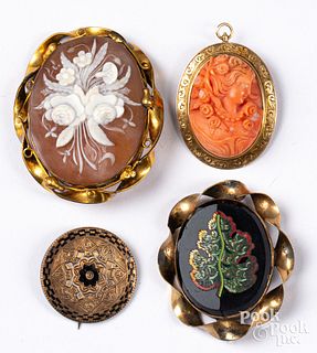 Four antique brooches