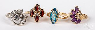 Four 14K gold and gemstone rings