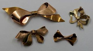 JEWELRY. Gold Bow Form Jewelry Grouping.