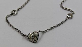 JEWELRY. Heart-Shaped Diamond Necklace.