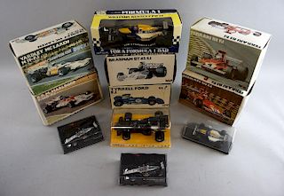 Boxed Formula 1 models including David Coulthard and Mika Hakkinen's McLaren Mercedes MP4/14 racing cars by Minichamps; Brabh