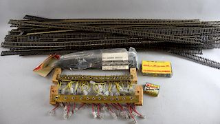 Hornby OO gauge to include a large quantity of track, accessories to include station, signals etc.,