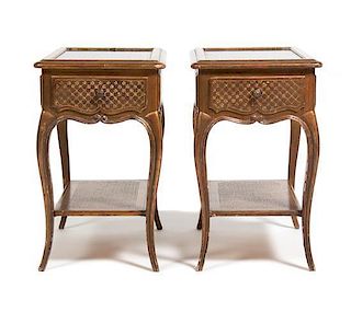 A Pair of Giltwood End Tables, Height 22 x width 23 1/4 x depth 13 3/4 inches.