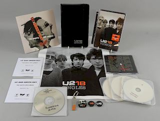 U2 - 18 Singles DVD, U218 notebook, promo plastic bags, U218 badges, key ring, ﾑWindows In The Skyﾒ promo CD & two promo 