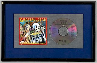 The Grateful Dead - Signed CD insert of the American Rock band by Jerry Garcia & Bobby Weir, framed with CD, 9.5 x 15 inches