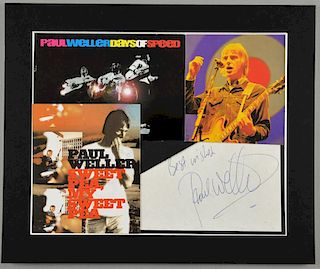 Paul Weller - An autographed white paper page, inscribed in blue ink 'Best Wishes, Paul Weller', with images of the artist, t