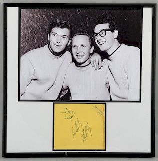 Buddy Holly & The Crickets - A signed autograph book page, signed by all three in blue and black ink, mounted together with a